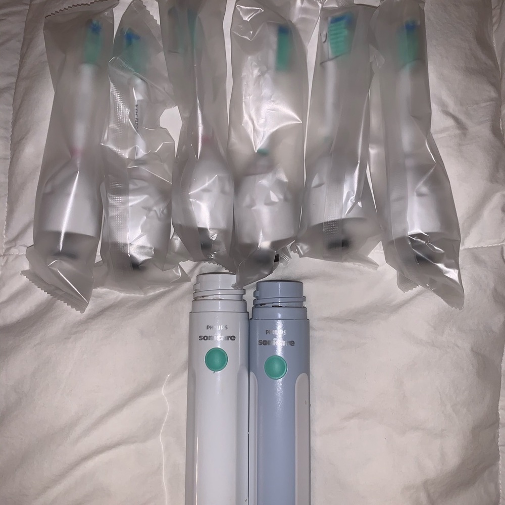 Sonicare E series toothbrush with brush heads